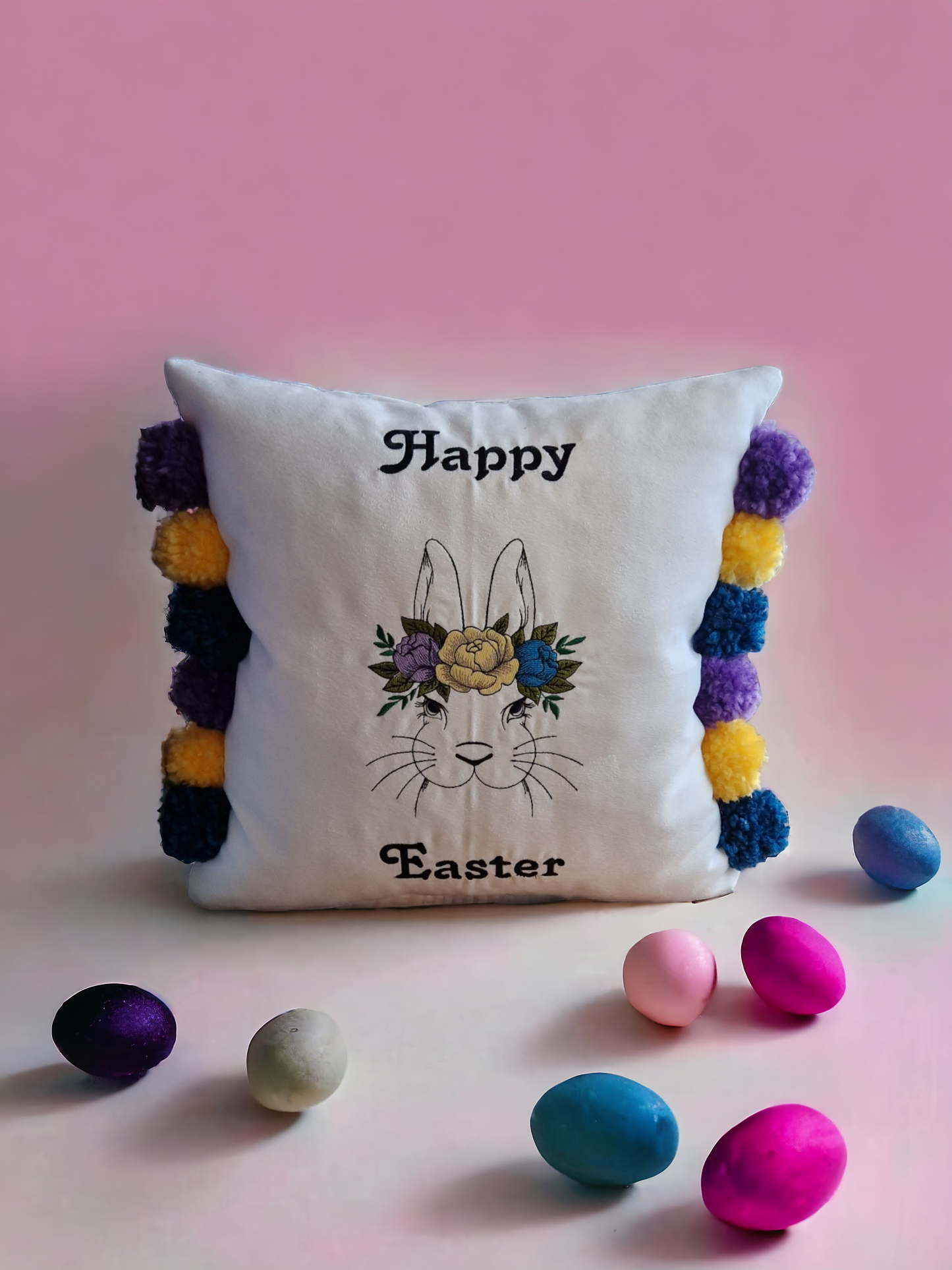 Easter embroidered cushion with pompoms