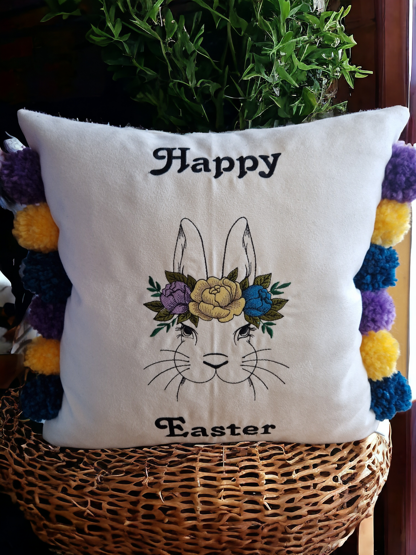 Easter embroidered cushion with pompoms