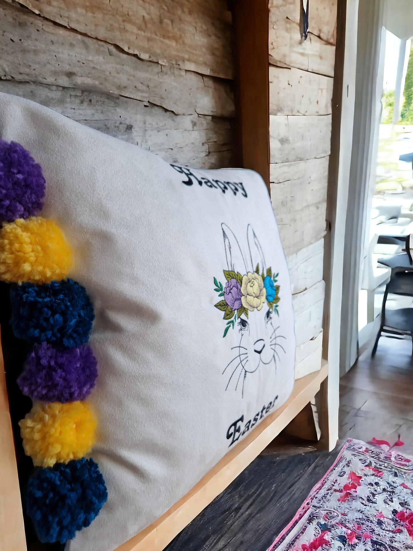 Easter embroidered cushion with pompoms