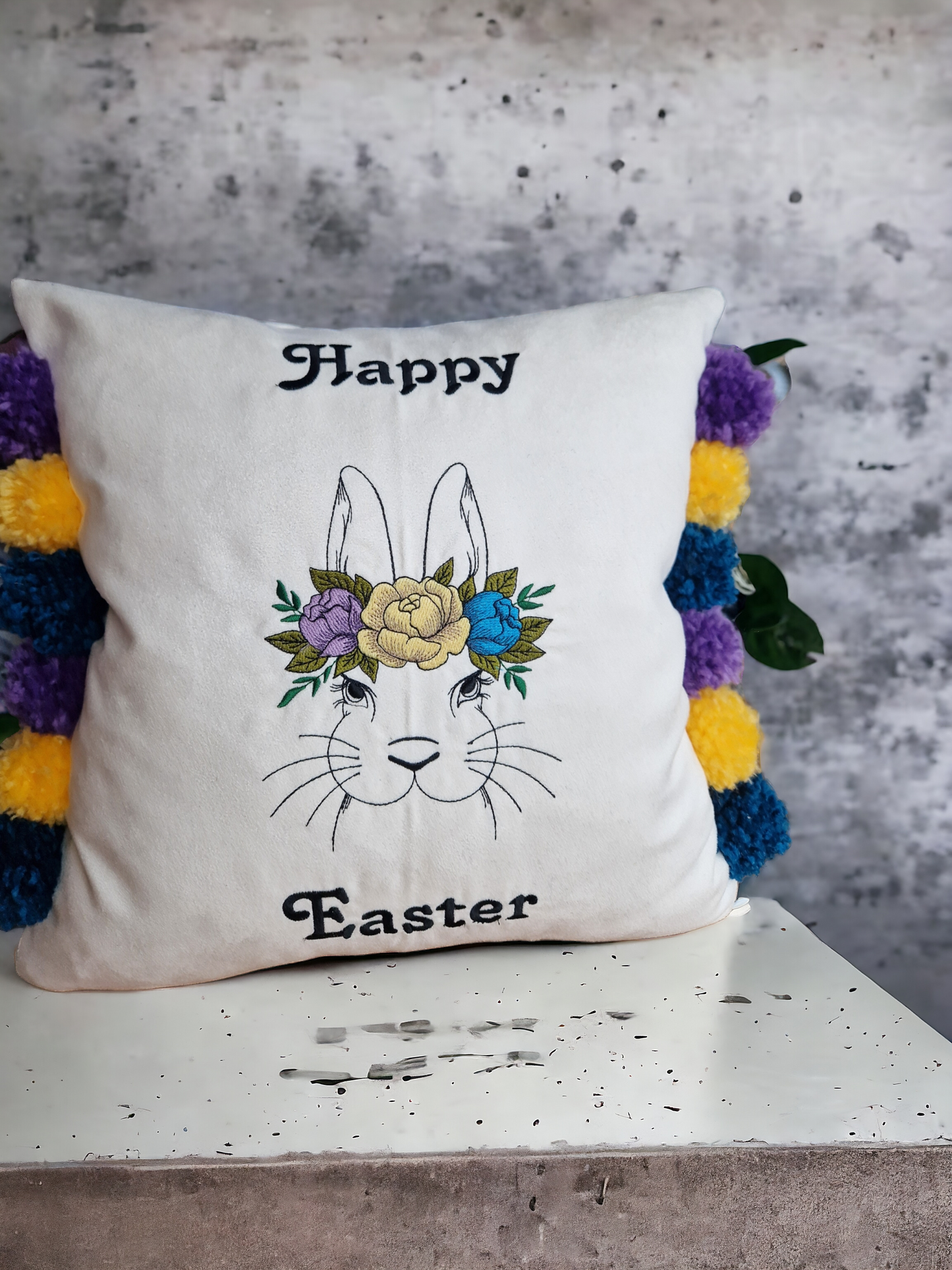 Easter embroidered cushion with pompoms