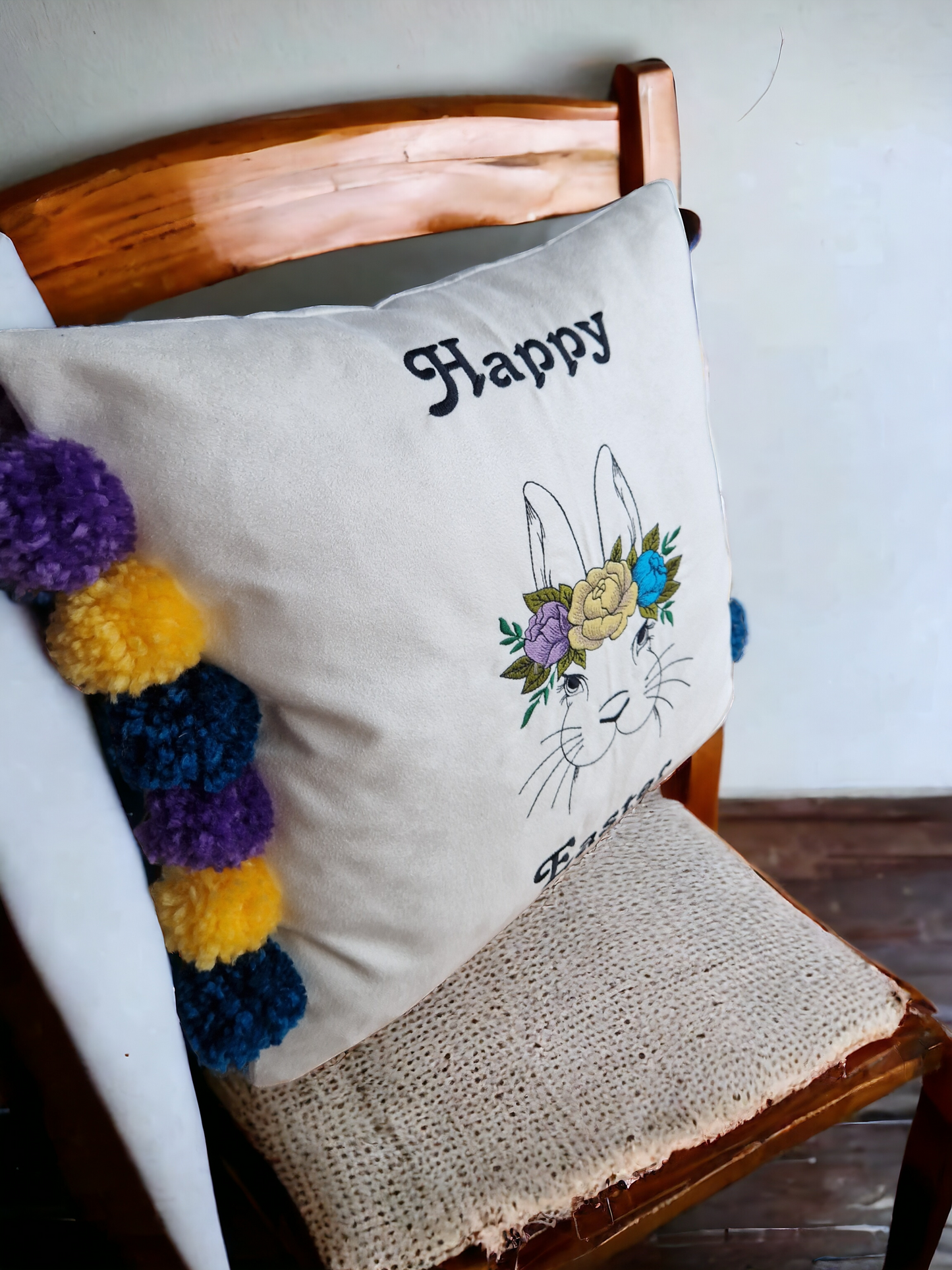 Easter embroidered cushion with pompoms