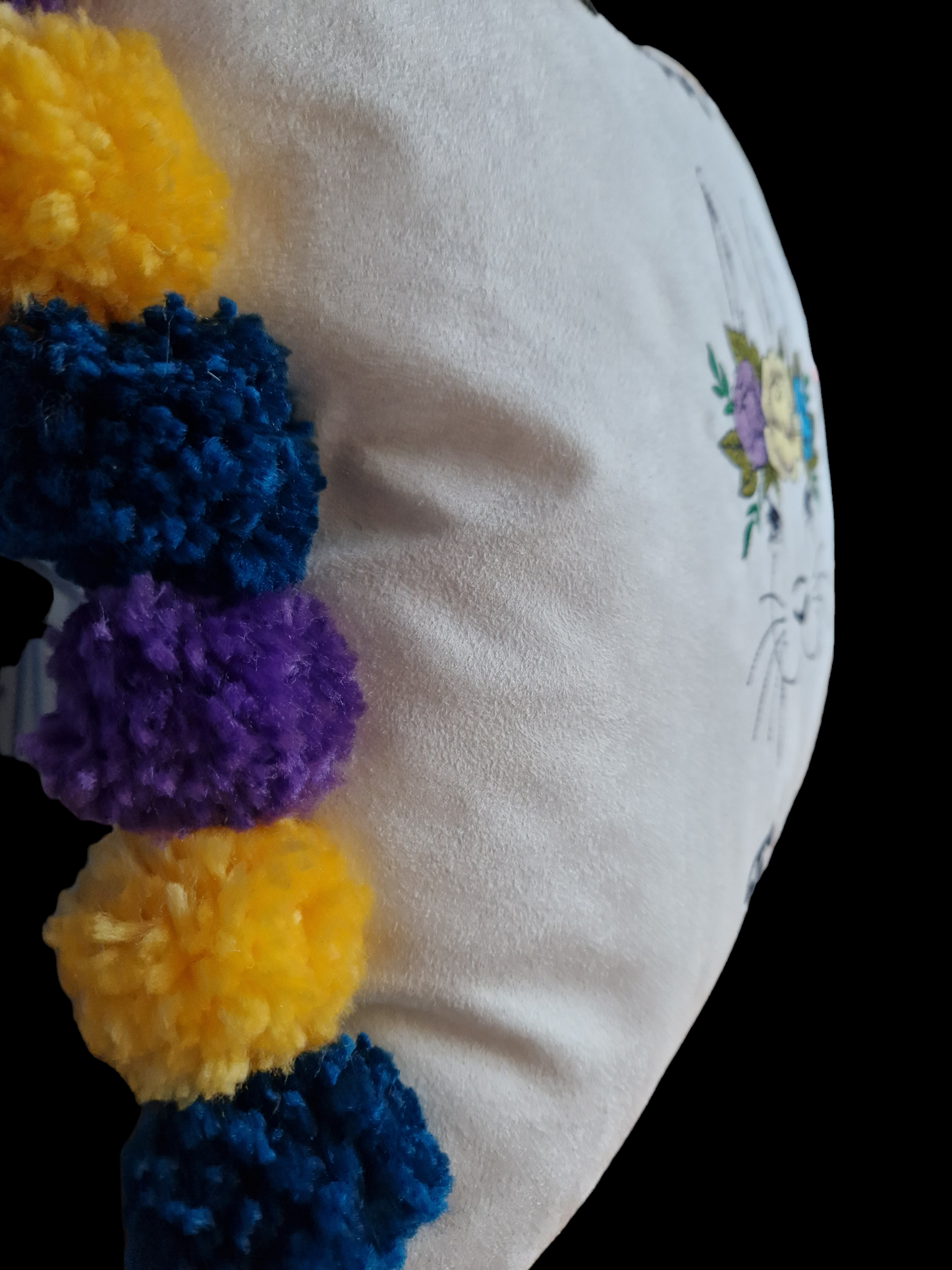 Easter embroidered cushion with pompoms