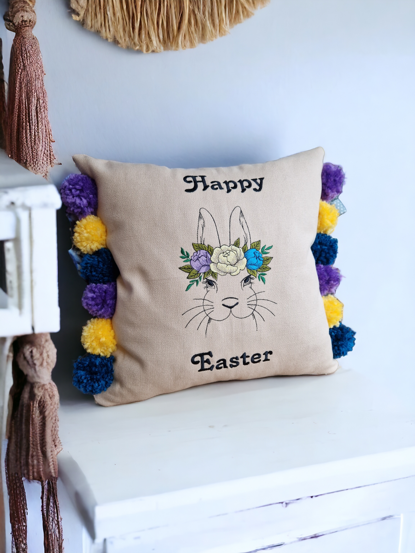 Easter embroidered cushion with pompoms