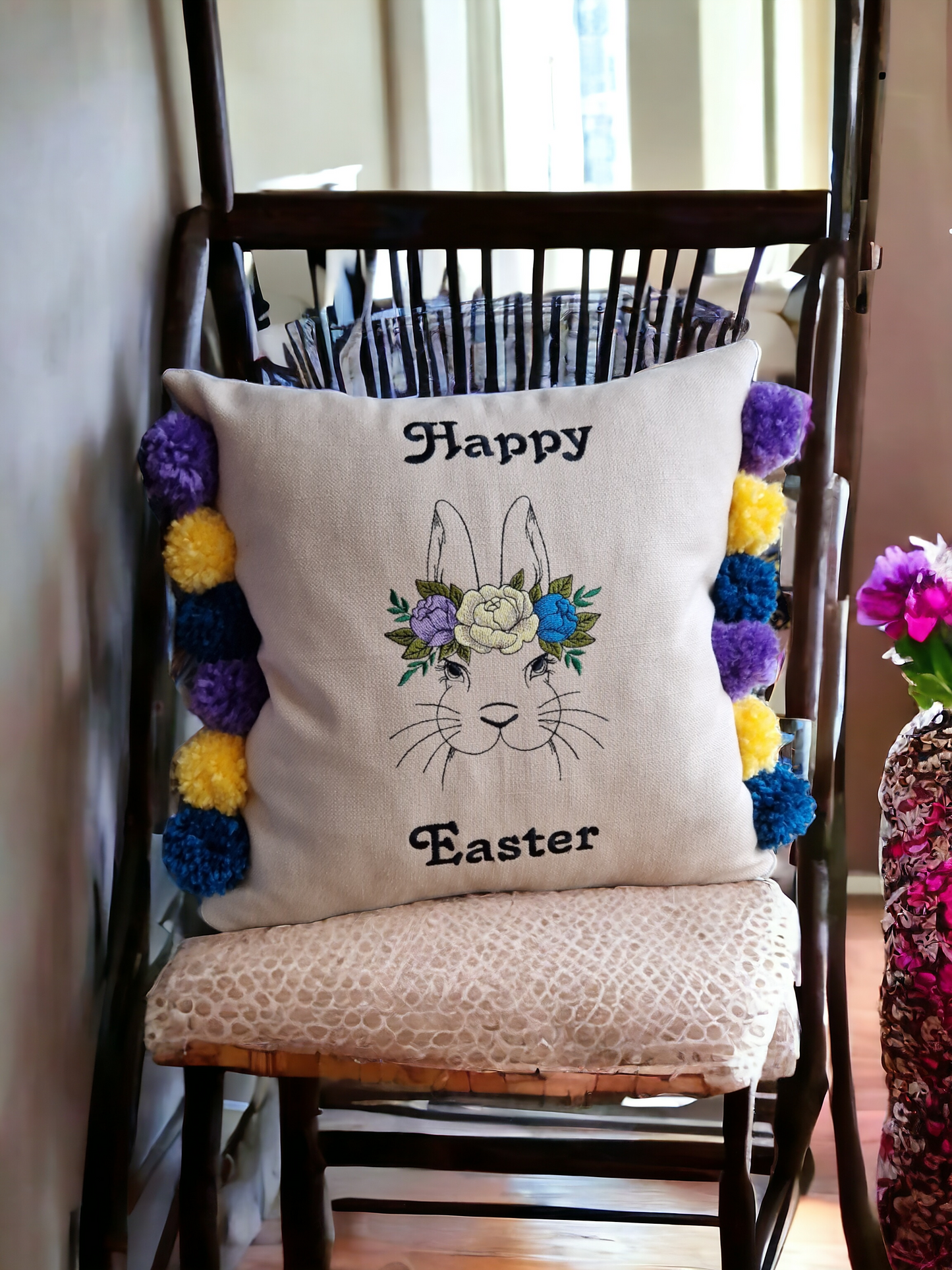 Easter embroidered cushion with pompoms