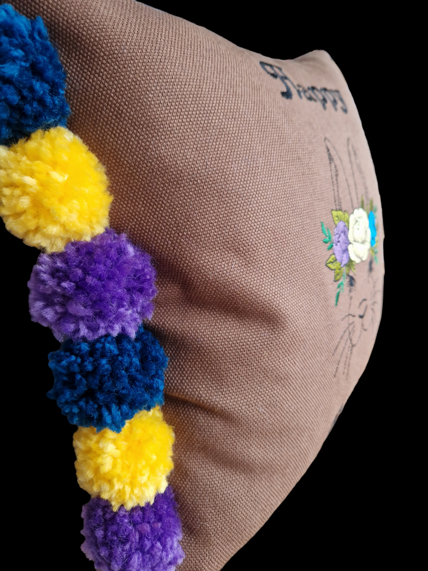 Easter embroidered cushion with pompoms