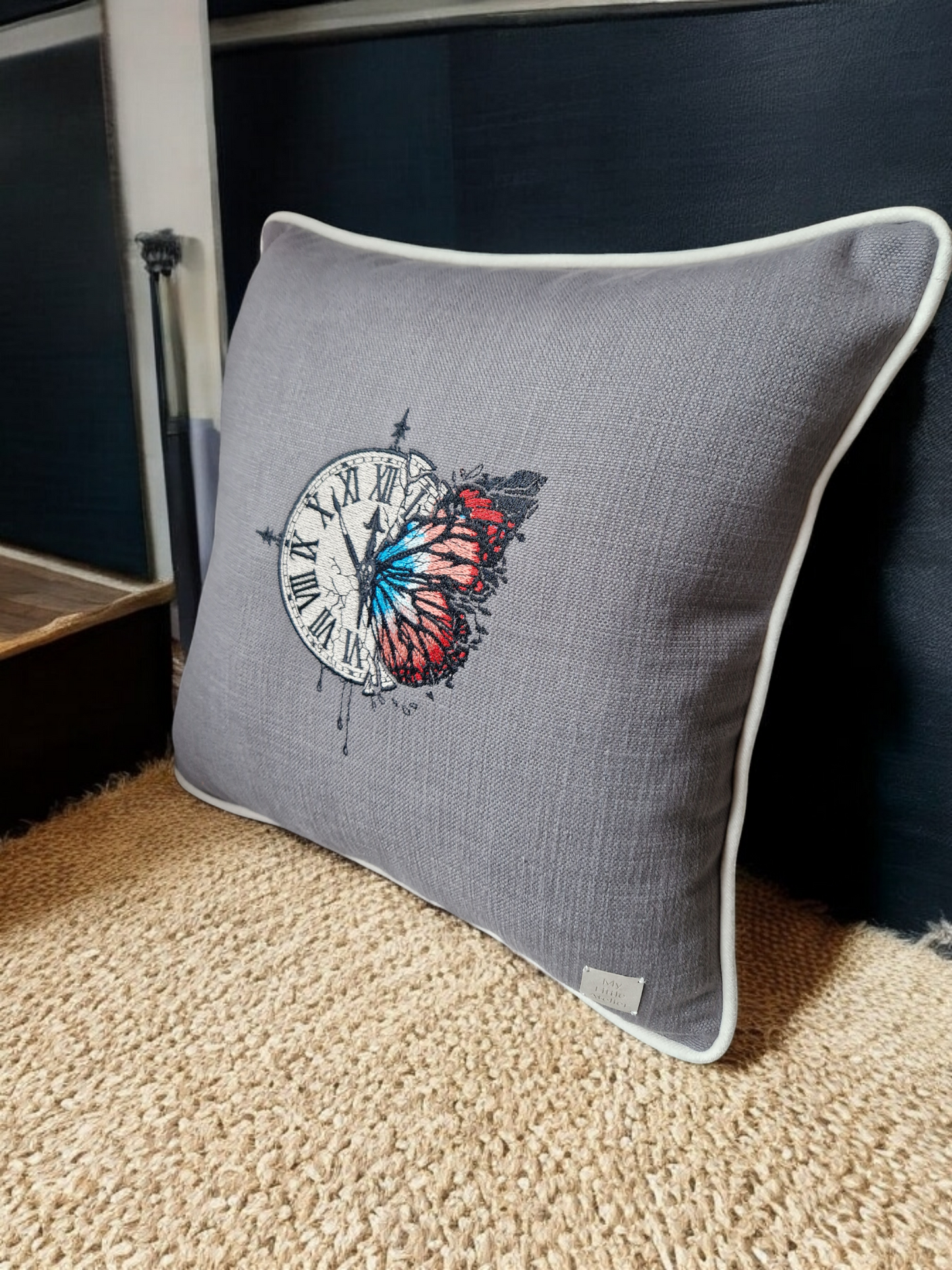 Embroidered cushion "clock with a butterfly"