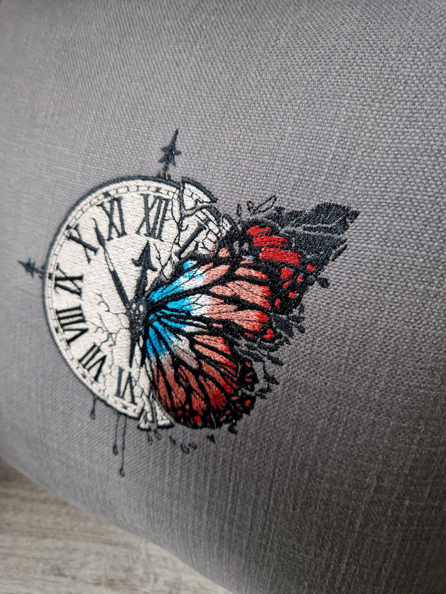 Embroidered cushion "clock with a butterfly"