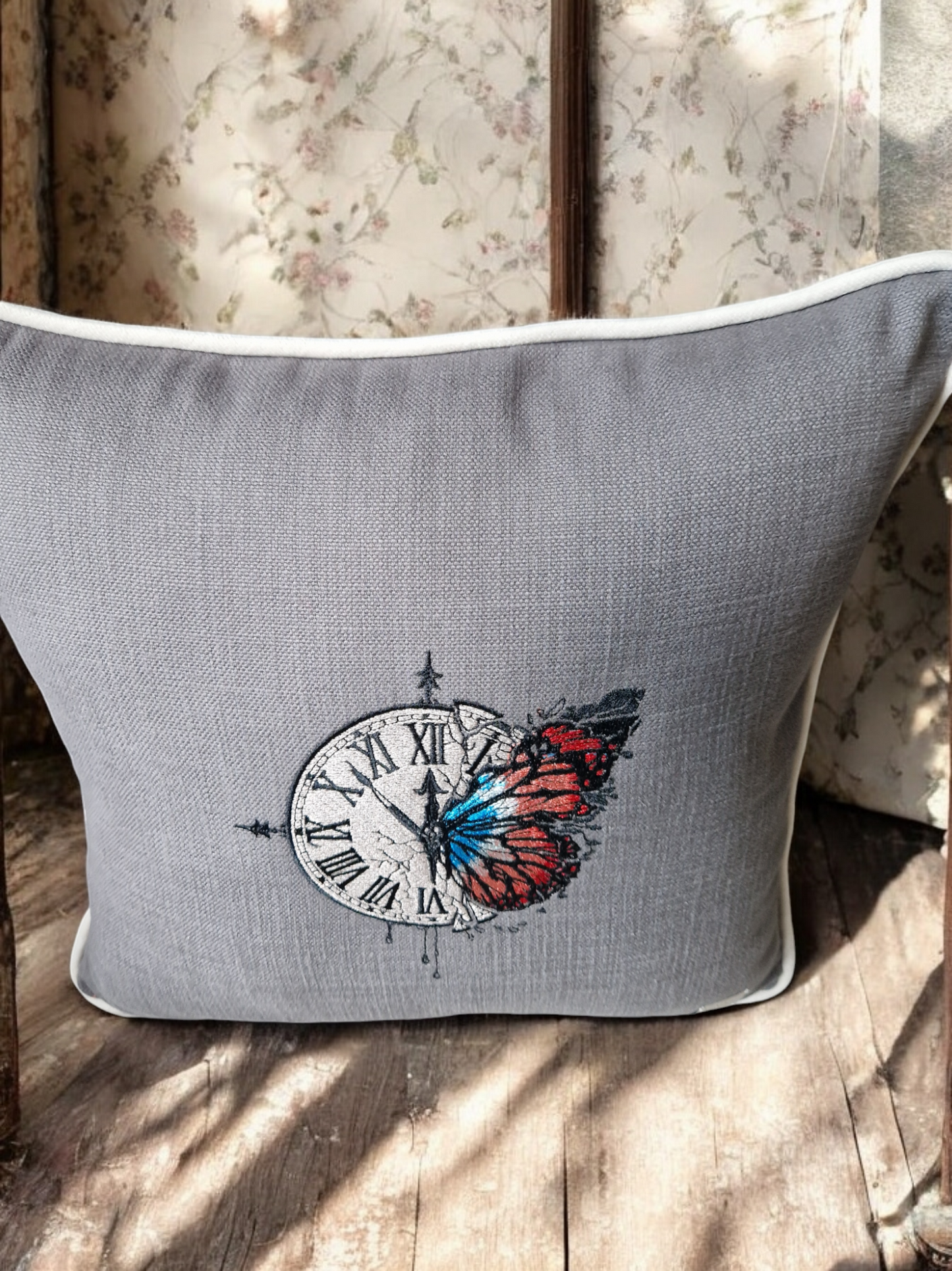 Embroidered cushion "clock with a butterfly"