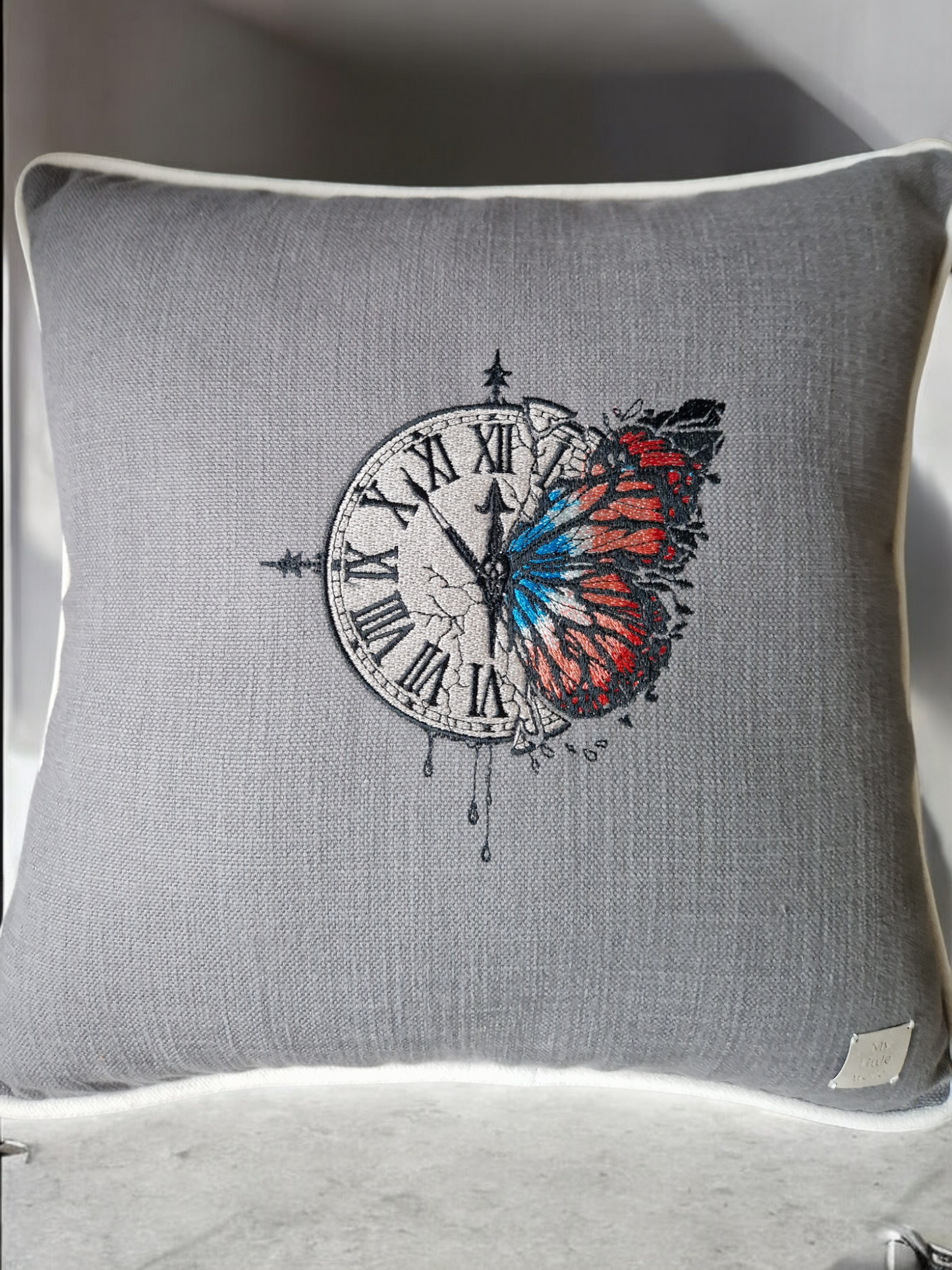 Embroidered cushion "clock with a butterfly"