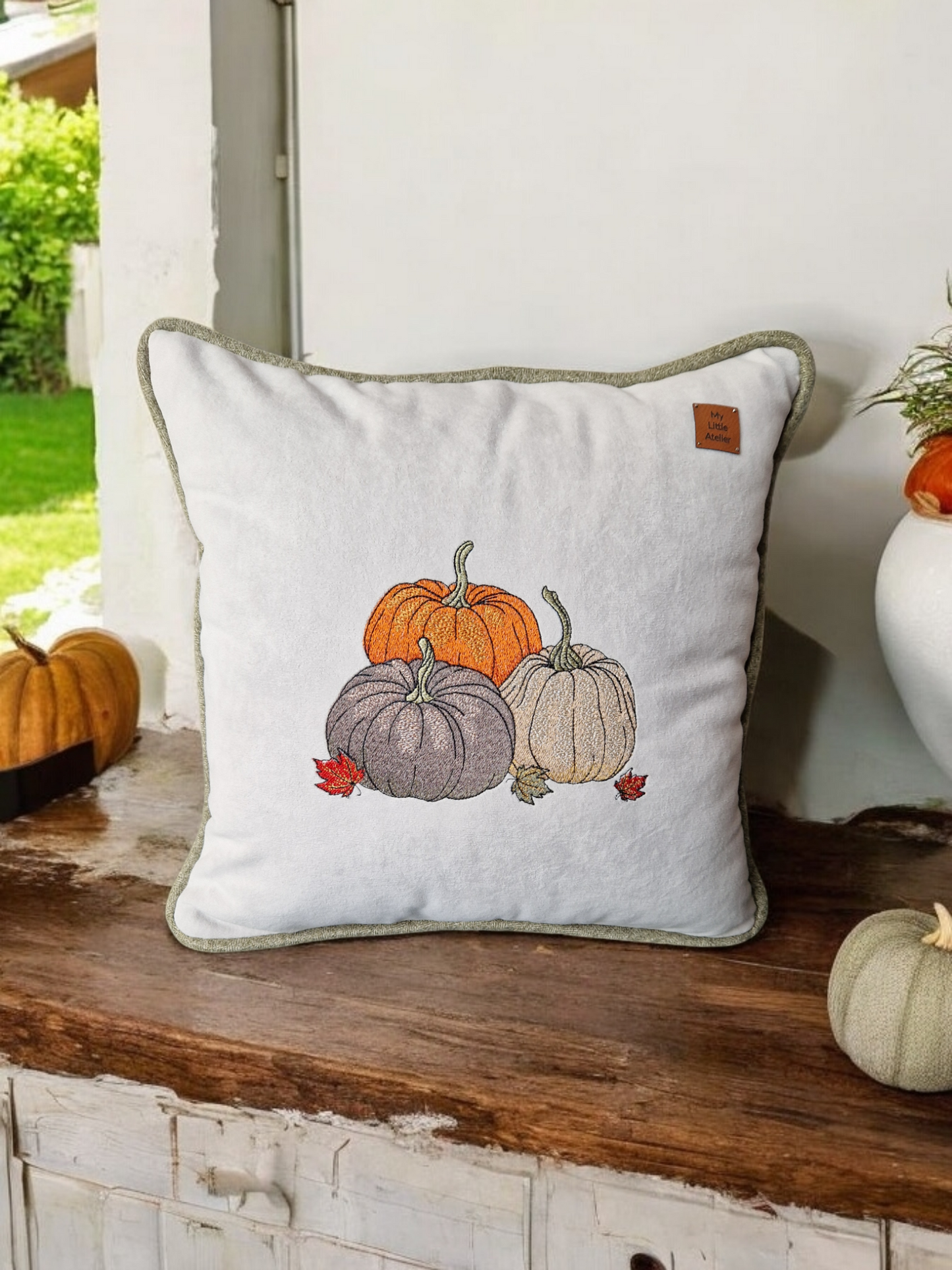 Embroidered "triple pumpkin" light grey cushion