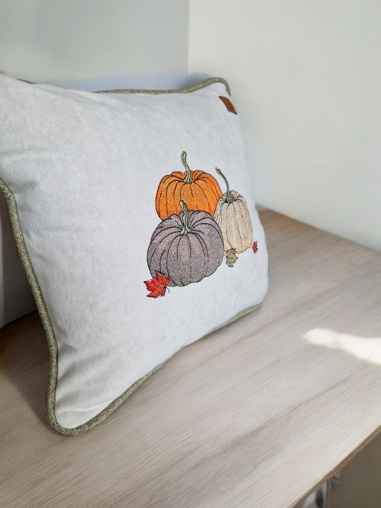 Embroidered "triple pumpkin" light grey cushion