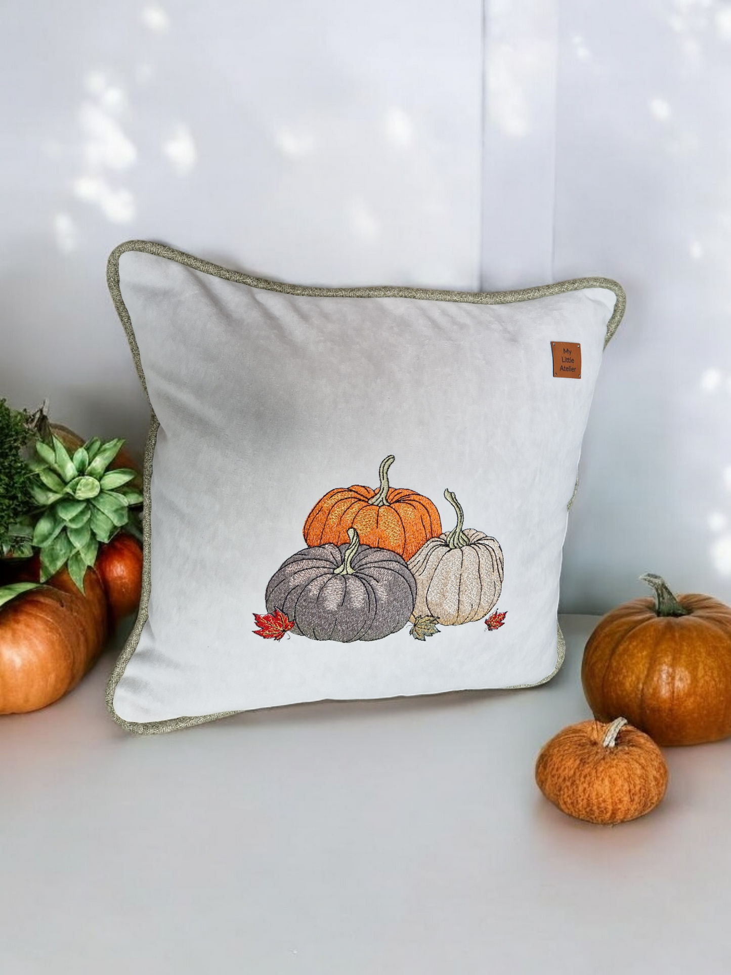 Embroidered "triple pumpkin" light grey cushion