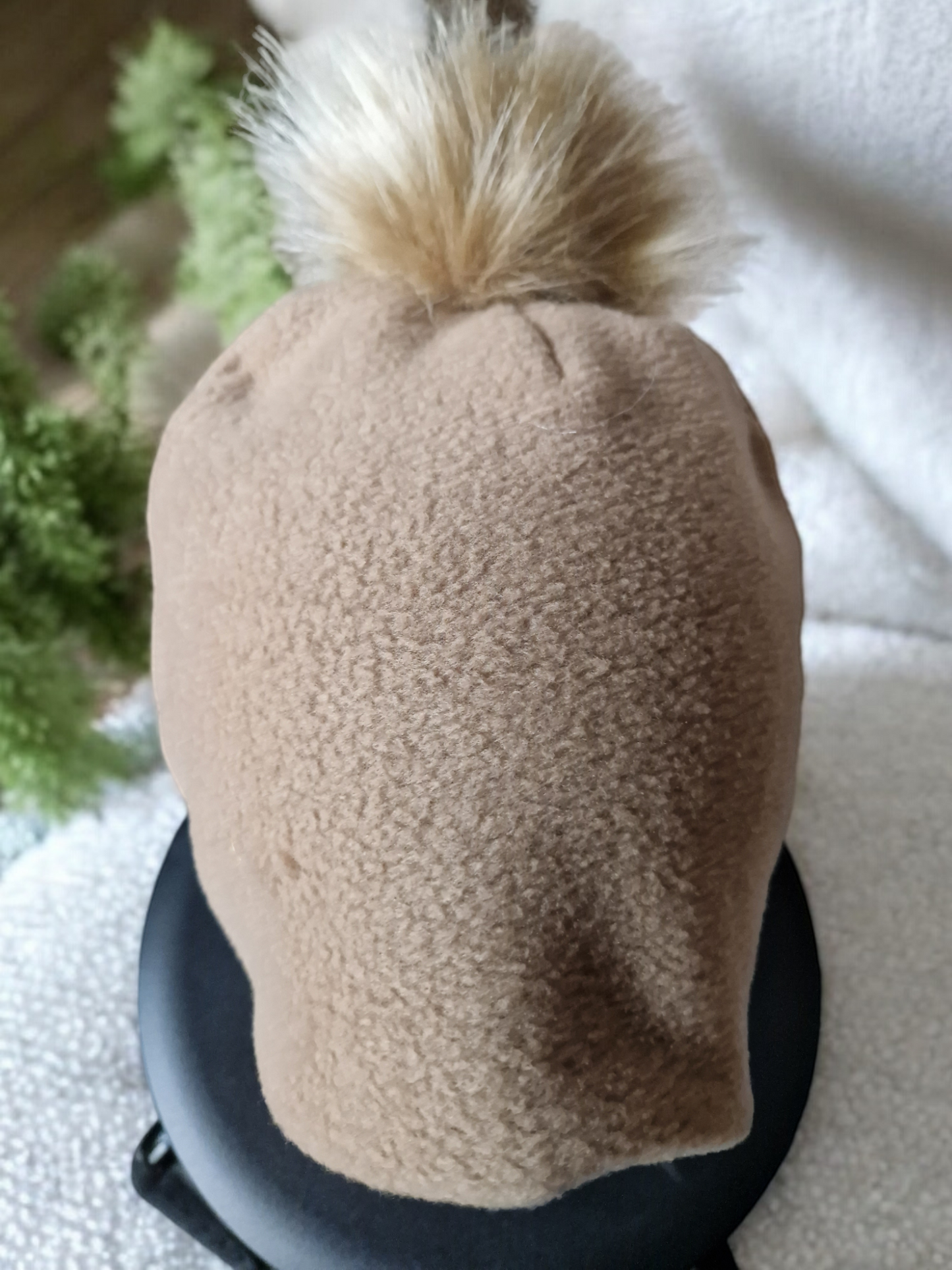 Carmel beige women's fleece hat with carmel fur pompom.